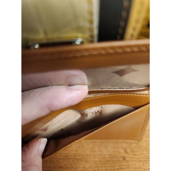 Mcm conganc leather compact wallet  Eight card slots and lots of compartments  E - Picture 7 of 13